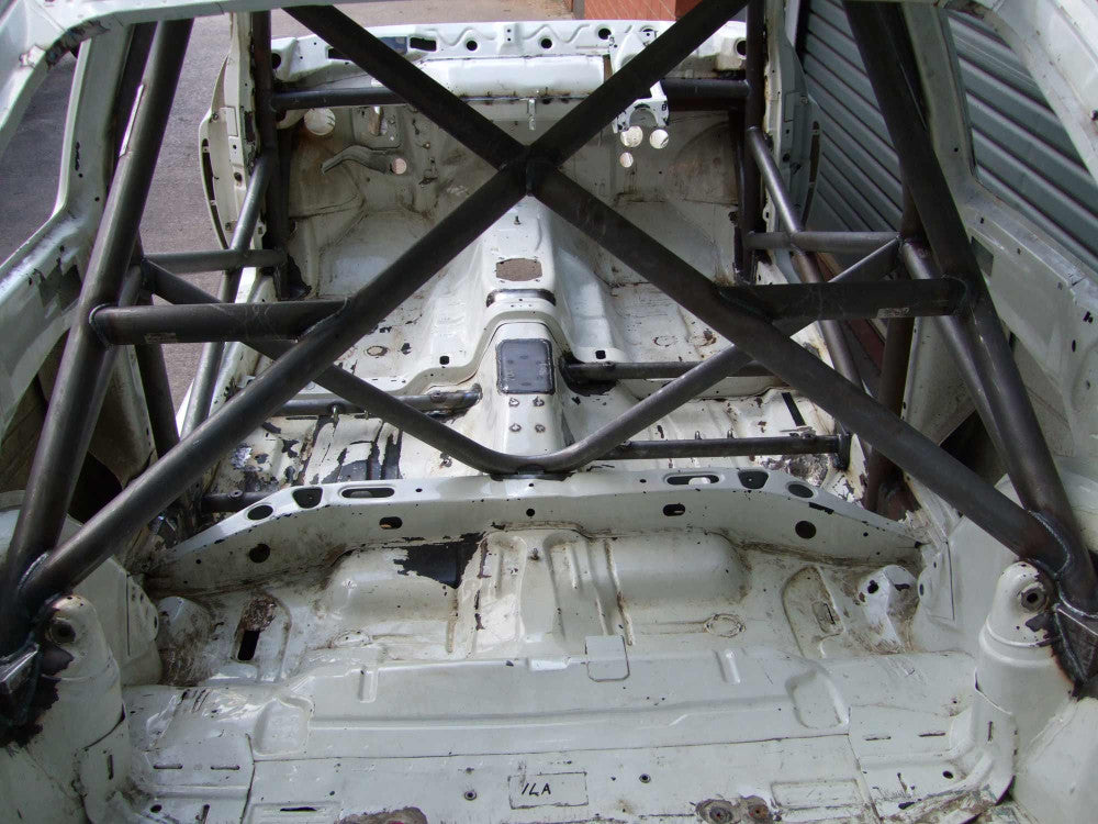 kit de jaula de seguridad multipunto CDS internacional FORD Escort Cosworth. Certificado por la FIA